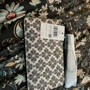 kate spade Black & White Floral Zip Wristlet with Gold Logo